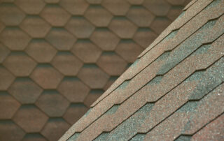 The texture of the roof with asphalt shingles. Waterproof roofing