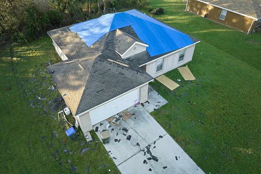 storm-damage Blue sky and Residential brown roof